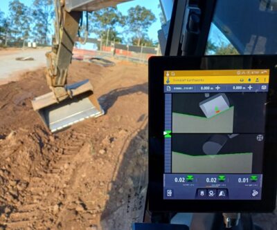 Technicians installing underground electrical and gas pipelines.