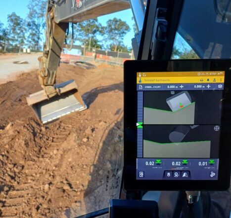 Advanced excavator GPS machine control system in use on a Pavitt Group earthmoving site.